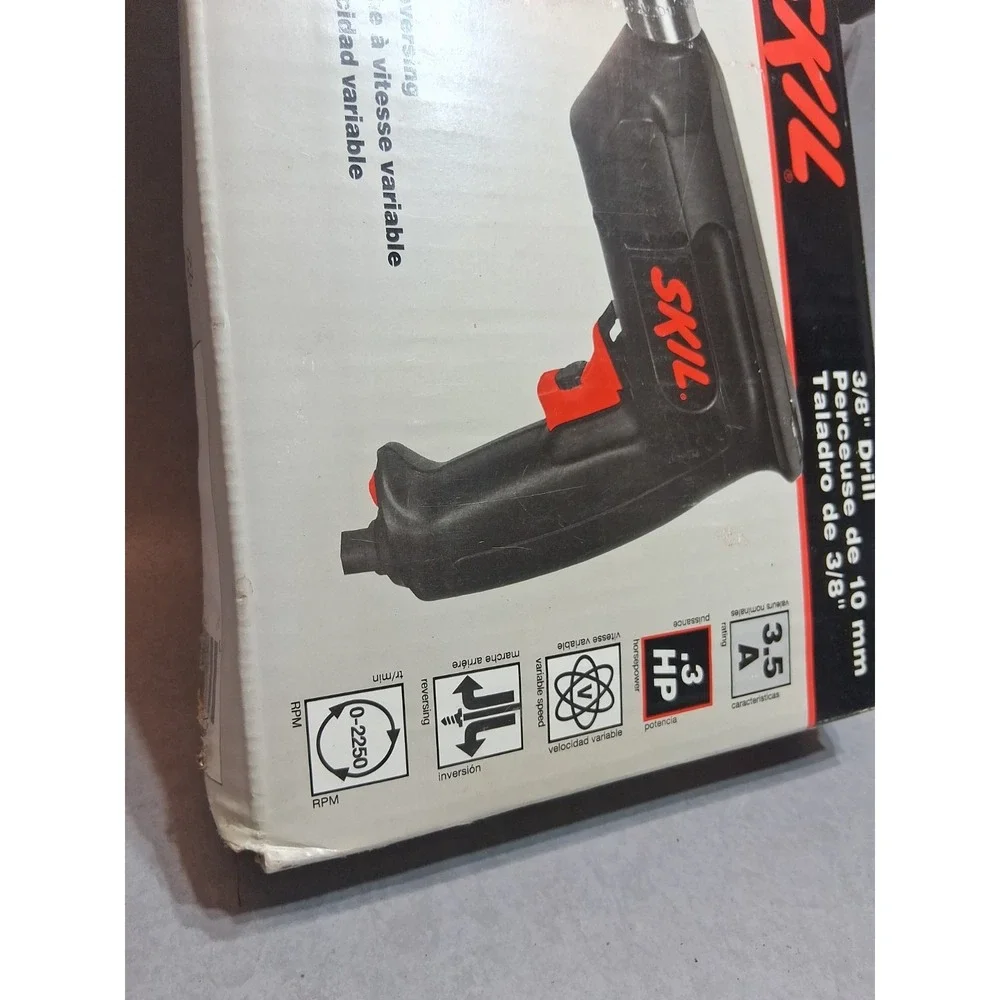 SKIL 6215 3/8 Variable Speed Reversing Drill. Chuck Key, Box And Book Included